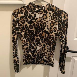 Fitted long sleeve high neck leopard print top from Gaze